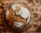 Fresh Bread On Dark Wood Board, Top View. Crisp. Homemade Loaf Of Bread