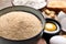 Fresh breadcrumbs and egg on table, closeup