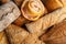 Fresh breads and pastry as background