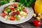 Fresh breakfast Omelette Salad with Parma Ham, feta cheese and vegetables