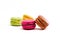 Fresh bright colored Macarons insolated on white
