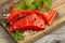 Fresh bright red Copper River Salmon fillets on rustic wooden se