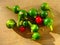 Fresh bright vegetables on a wood background. Green pepper, red chilli pepper. Autumn still life.
