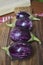 Fresh brinjal vegetable on chopping board