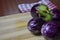 Fresh brinjal vegetable on chopping board