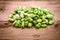 Fresh broad bean on old wooden