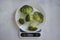 Fresh broccoli kitchen scale  ingredient organic gourmet health  on a light background