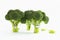 Fresh broccoli with scared cartoon style faces on white background