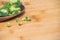 Fresh broccoli solated on a wooden background