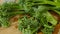 Fresh Broccolini vegetables on a cutting board