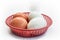 Fresh of brown eggs and white eggs salted eggs in red basket