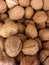 Fresh brown walnuts on display at market