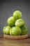 Fresh brussels sprouts on wooden table