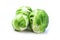 Fresh Bruxelles sprouts on white background closeup.