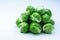 Fresh Bruxelles sprouts on white background closeup.