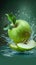 Fresh burst Water splashing on a green apple and cut slice