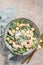 Fresh caesar salad on bowl with parmesan cheese and shrimps