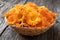 Fresh calendula flowers in a wicker basket