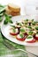 Fresh caprese salad with delicious tomatos + mozzarella and bas