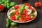 Fresh caprese salad with mozarrella and tomato