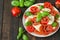 Fresh caprese salad with mozarrella and tomato