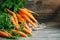 Fresh Carrot on Wooden Table in Garden. Vegetables Vitamins Keratin. Natural Organic Carrot lies on Wooden background