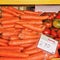 Fresh carrots, carrots piled on top of each other for sale