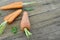 Fresh carrots and sliced on wooden was taken from a rather unusual angle