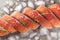 Fresh catch Salmon fillets on ice, artfully arranged in the kitchen