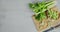 Fresh celery on a cutting Board with cool steam.