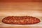 Fresh cereal bread on wooden background