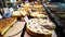 Fresh cheesecake for sale in a marketplace