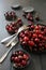 Fresh cherries in aluminum plates