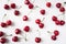 Fresh cherries scattered on white. Cherries on a white background. Cherry fruit. Creative fresh cherry pattern background with cop