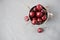 Fresh cherries with water drops in a bowl