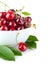 Fresh cherry berries with green leaf