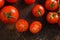 Fresh cherry tomatoes on a metal rustic old background  half sliced and whole art