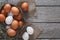 Fresh chicken brown eggs on sack, organic farming background