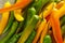 Fresh chili peppers on table, closeup