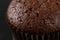 Fresh chocolate muffin. Brown cupcake.