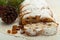 Fresh Christmas Stolle Dresden with raisins closeup with pine br
