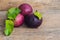 Fresh Chrysophyllum cainito fruits on wood background