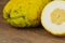 Fresh citron fruits closeup on a wooden board