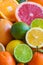 Fresh citrus fruits orange, lemon, grapefruit, mandarin, lime with leaves