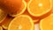 Fresh citrus fruits. Rotate Video footage of the concept of a healthy food and diet. Spinning sliced oranges