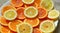 Fresh citrus sliced fruits top view solar background