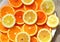 Fresh citrus sliced fruits top view solar background