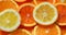 Fresh citrus sliced fruits top view solar background