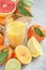 Fresh citruses and juice. Lemons, limes, clementines, grapefruit