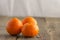 Fresh clementines on a wooden table